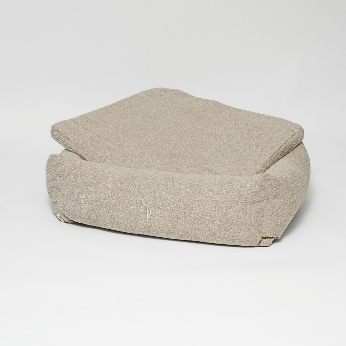 Vera dog bed in oat bouclé